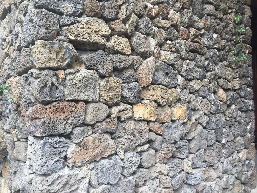 old red lava stone wall